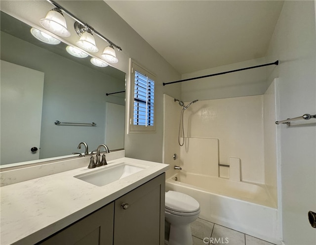 bathroom with vanity, bathing tub / shower combination, toilet, and tile patterned floors