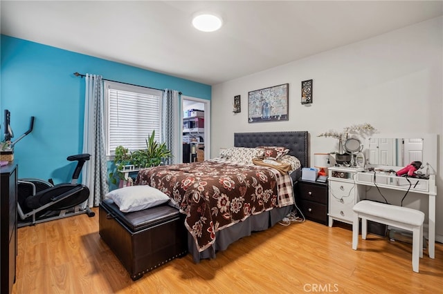 bedroom featuring wood-type flooring