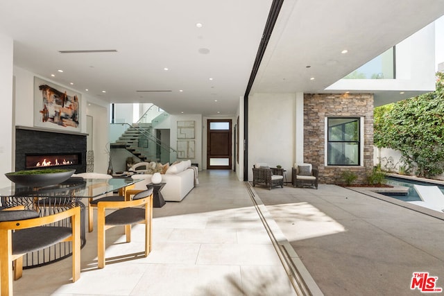 interior space with a stone fireplace