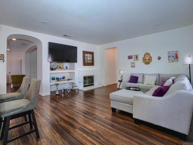 living room with dark wood-type flooring