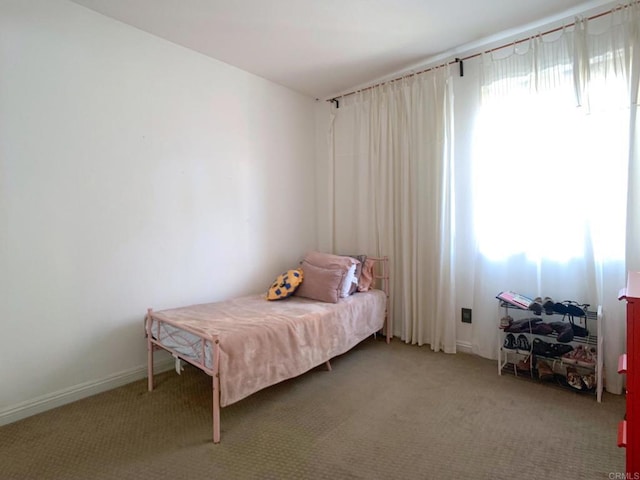 bedroom featuring carpet flooring