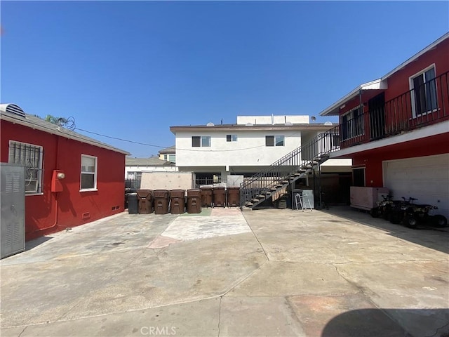 rear view of house with a patio area