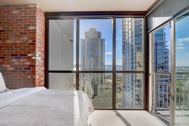 unfurnished bedroom with floor to ceiling windows