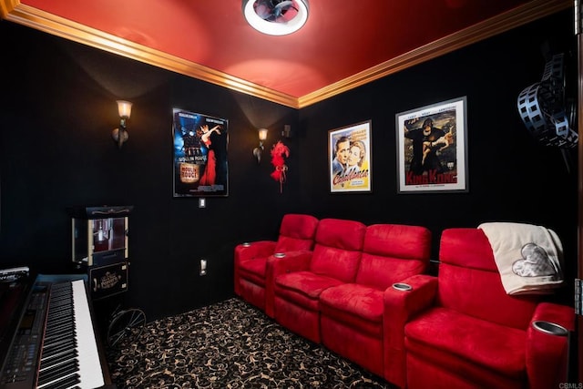 home theater room featuring crown molding