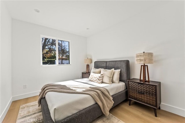 bedroom featuring light wood-type flooring