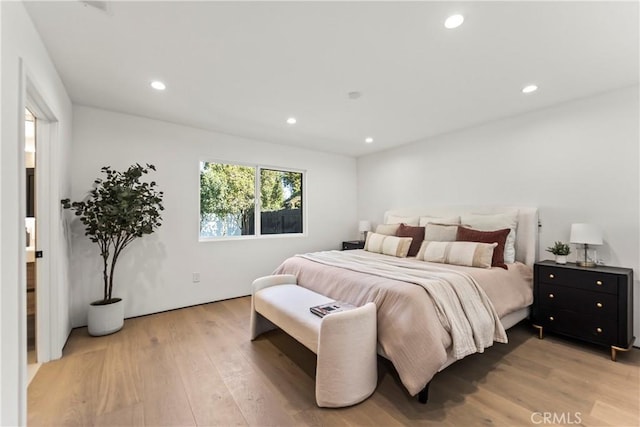 bedroom with light hardwood / wood-style flooring