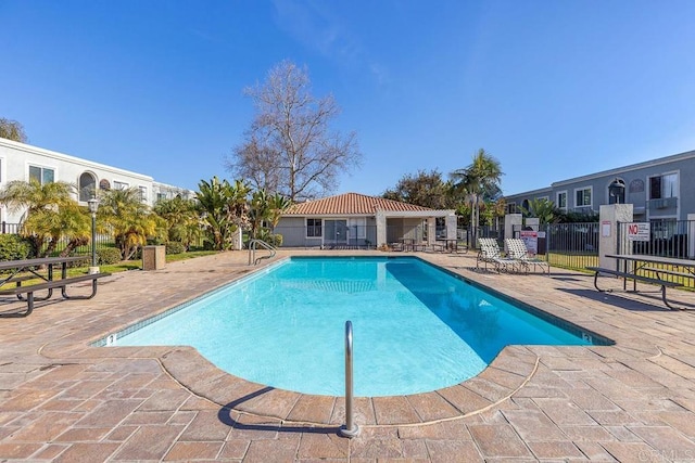 view of pool featuring a patio area