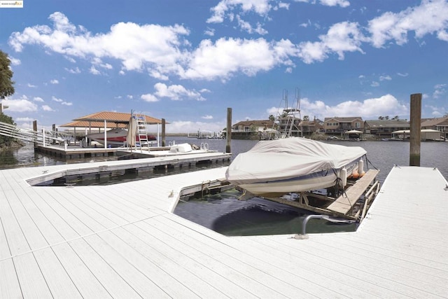 dock area featuring a water view