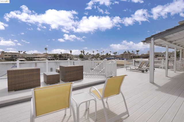 wooden deck with an outdoor living space