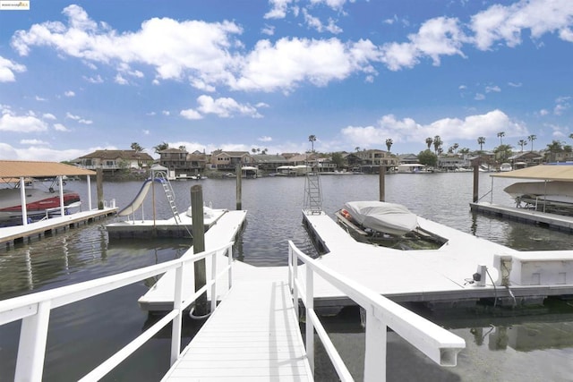 view of dock with a water view