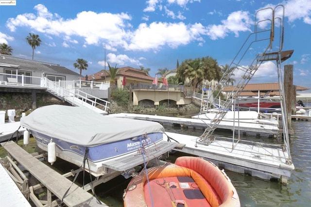 view of dock with a water view