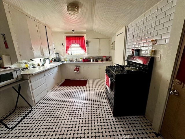 kitchen with wood ceiling, white cabinetry, sink, vaulted ceiling, and black range with gas stovetop