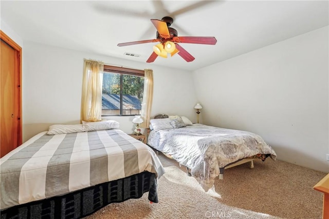 bedroom featuring ceiling fan and carpet flooring