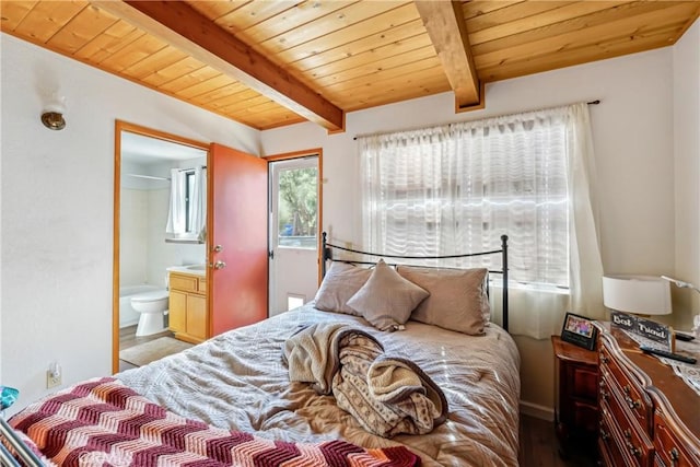 bedroom with ensuite bath, wood-type flooring, wooden ceiling, and beamed ceiling