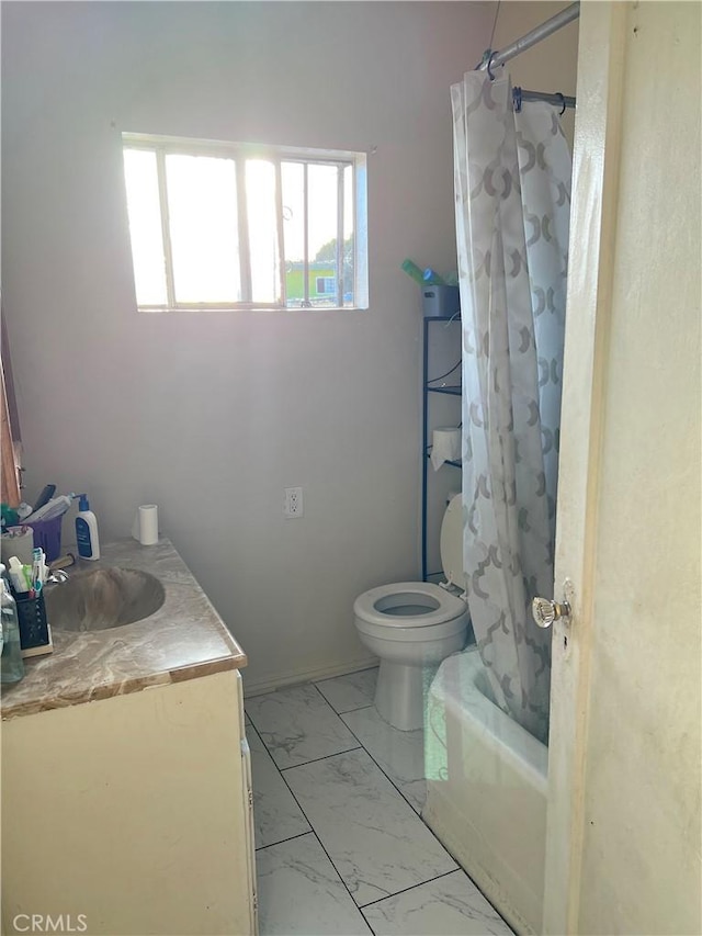 full bathroom featuring vanity, shower / bath combination with curtain, and toilet