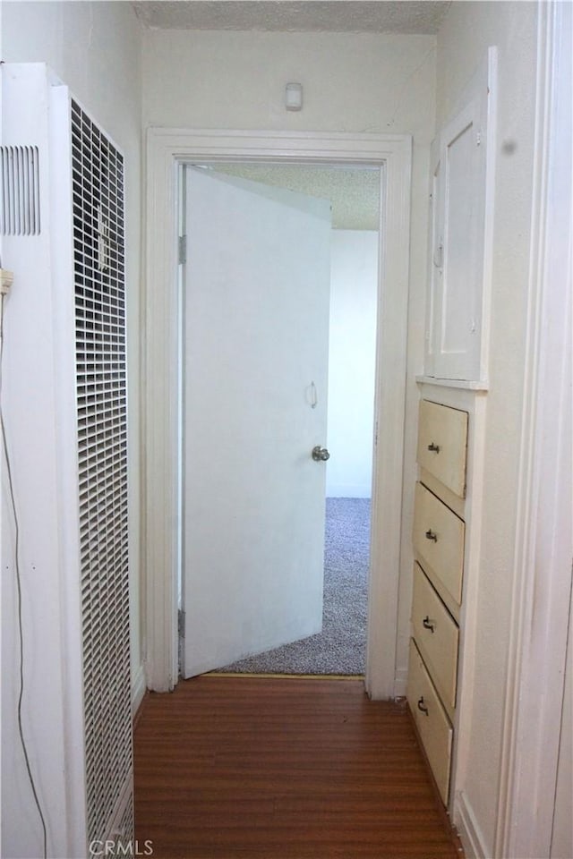 corridor featuring carpet floors