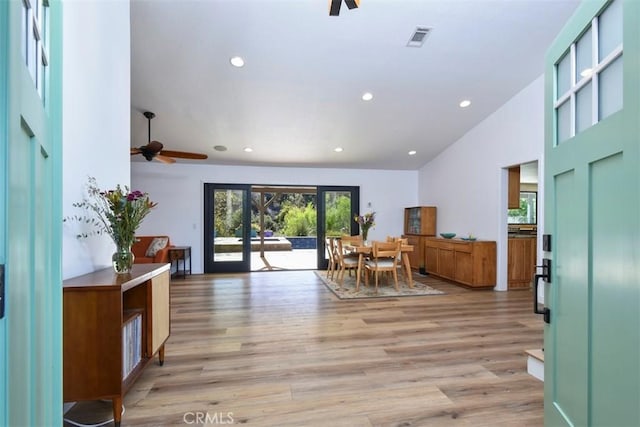 dining room featuring light hardwood / wood-style floors and ceiling fan