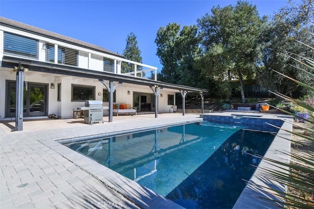 view of pool with a patio