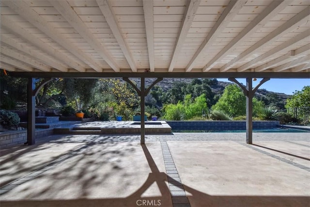 view of patio featuring a mountain view