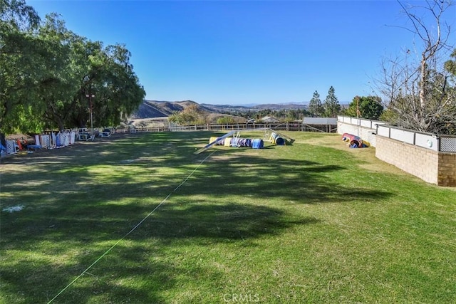 view of yard with a mountain view