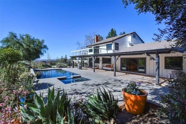 view of pool featuring a patio area