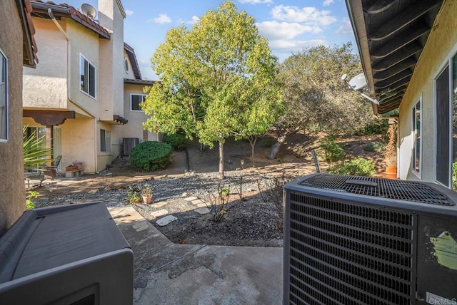 view of patio featuring cooling unit