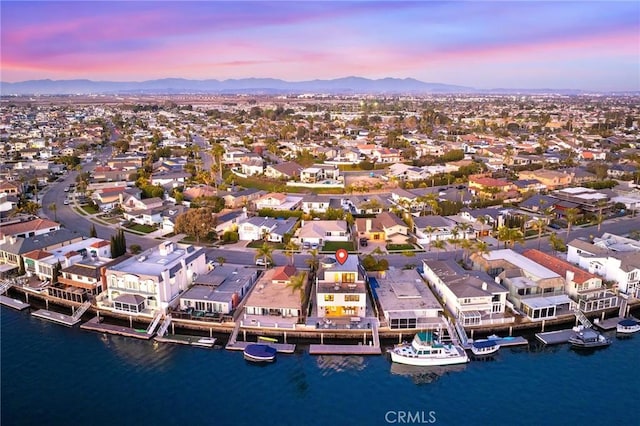 17007 Edgewater Ln, Huntington Beach, CA 92649 - aerial view at dusk with a water and mountain view