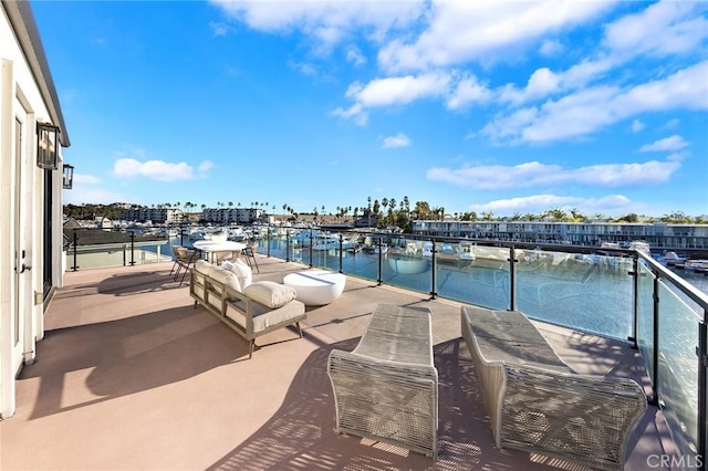 view of patio / terrace featuring a water view