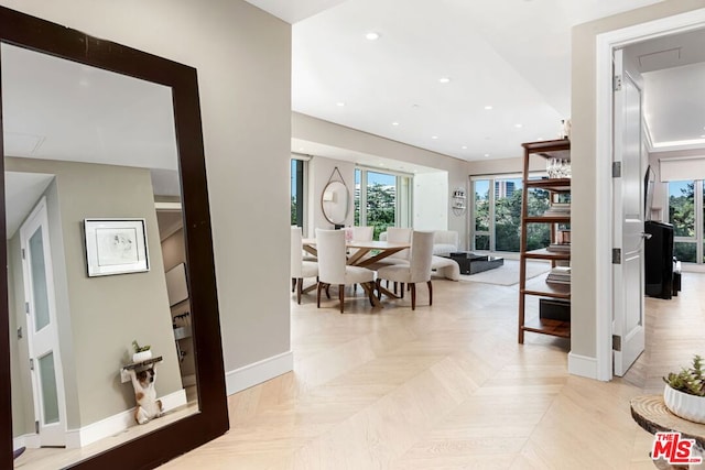 corridor with light parquet flooring