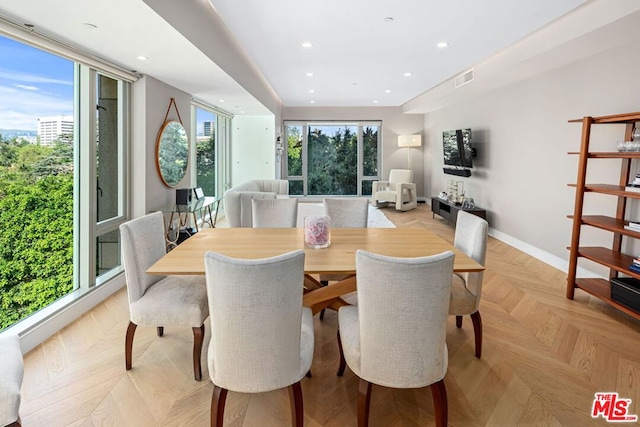 dining area with light parquet floors