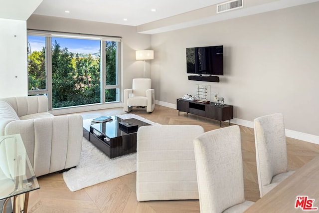 living room with parquet flooring