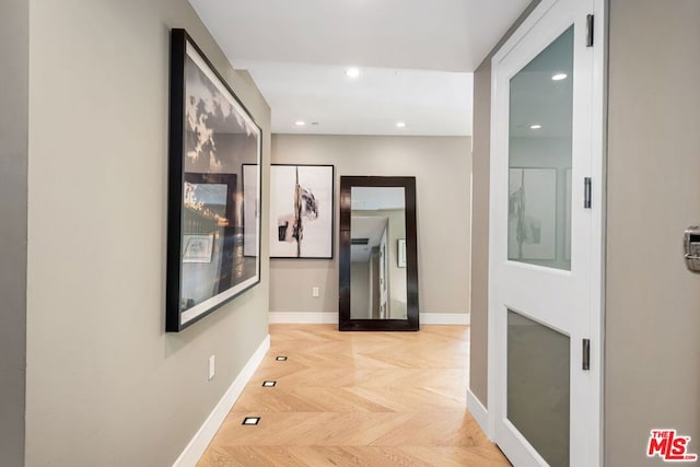 hall with light parquet flooring