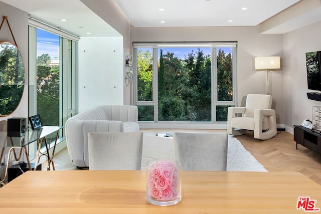 dining area featuring parquet floors