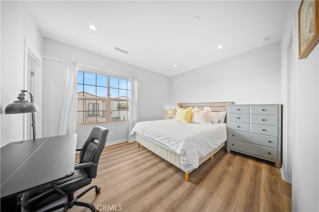 bedroom featuring hardwood / wood-style floors