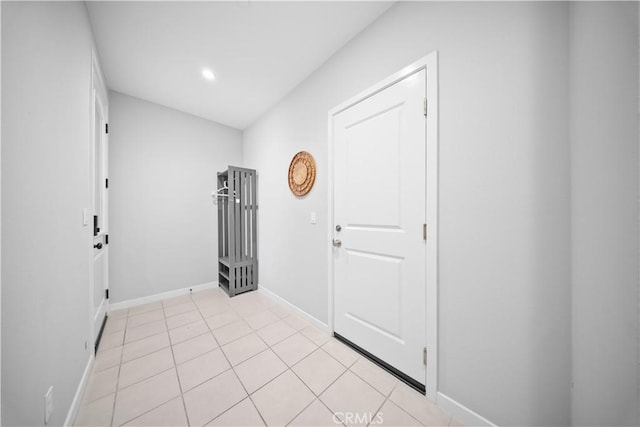 foyer featuring light tile patterned flooring