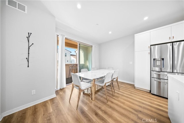 dining area featuring light hardwood / wood-style floors