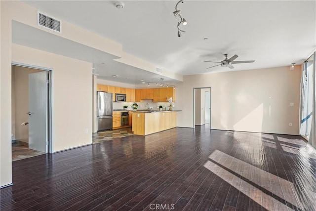 285 W 6th St Unit 426, San Pedro, CA 90731 - unfurnished living room featuring rail lighting, ceiling fan, and wood finished floors