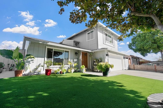 view of front facade with a garage and a front yard