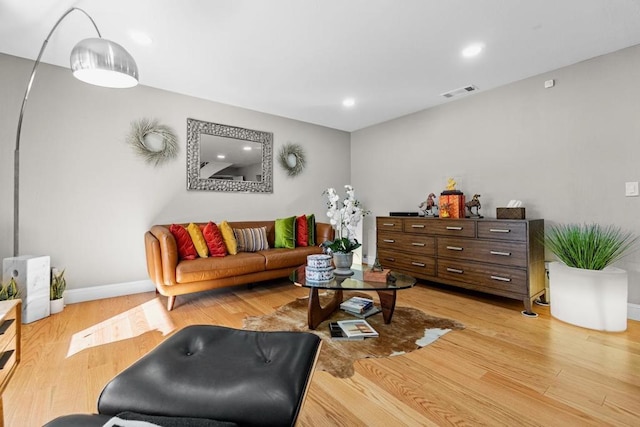 living room featuring light wood-type flooring