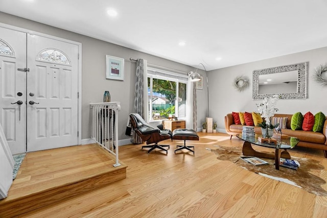 foyer entrance with light hardwood / wood-style flooring