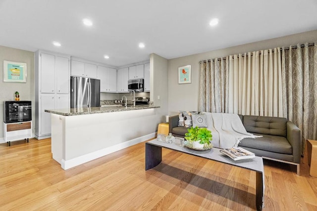 living room featuring light hardwood / wood-style floors