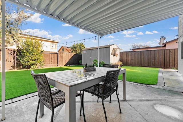 view of patio / terrace with a storage shed