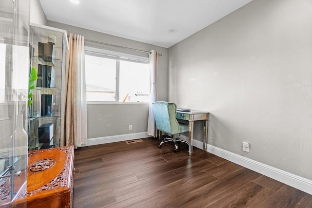 home office featuring dark hardwood / wood-style floors