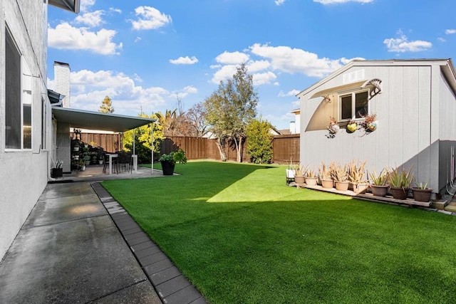 view of yard with a patio area