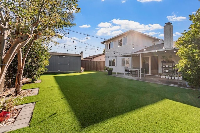 view of yard featuring a patio and a shed