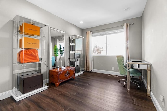 home office featuring dark hardwood / wood-style flooring