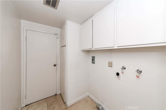 laundry room with washer hookup, cabinets, and gas dryer hookup