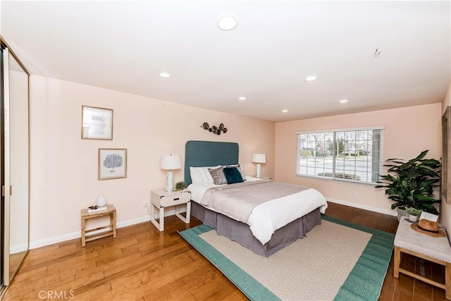 bedroom featuring hardwood / wood-style flooring