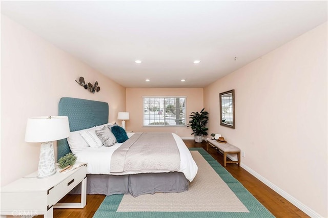 bedroom with hardwood / wood-style floors