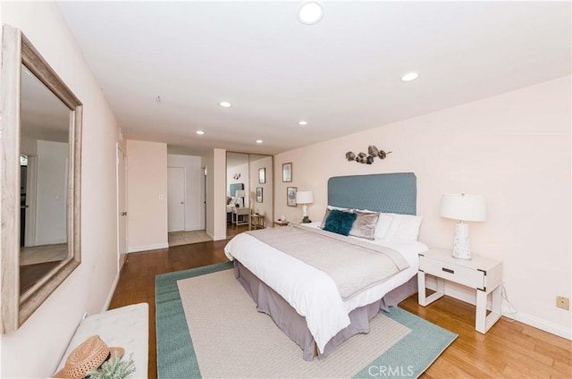 bedroom featuring wood-type flooring